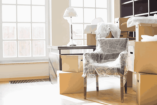 citycoast-removalist-services-room-with-moving-boxes-and-furniture